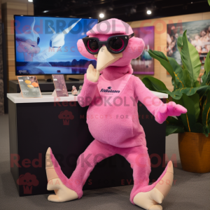 Pink Pterodactyl mascot costume character dressed with a Sweater and Sunglasses