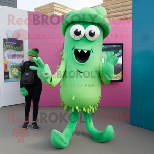 Green Fried Calamari mascot costume character dressed with a Trousers and Smartwatches