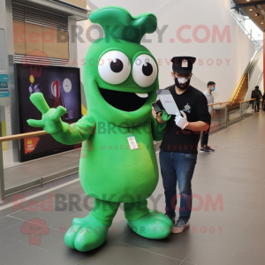 Green Fried Calamari mascot costume character dressed with a Trousers and Smartwatches