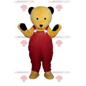 Maskottchen gelber Teddybär in roten Overalls - Redbrokoly.com