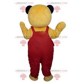 Mascote urso de pelúcia amarelo de macacão vermelho -