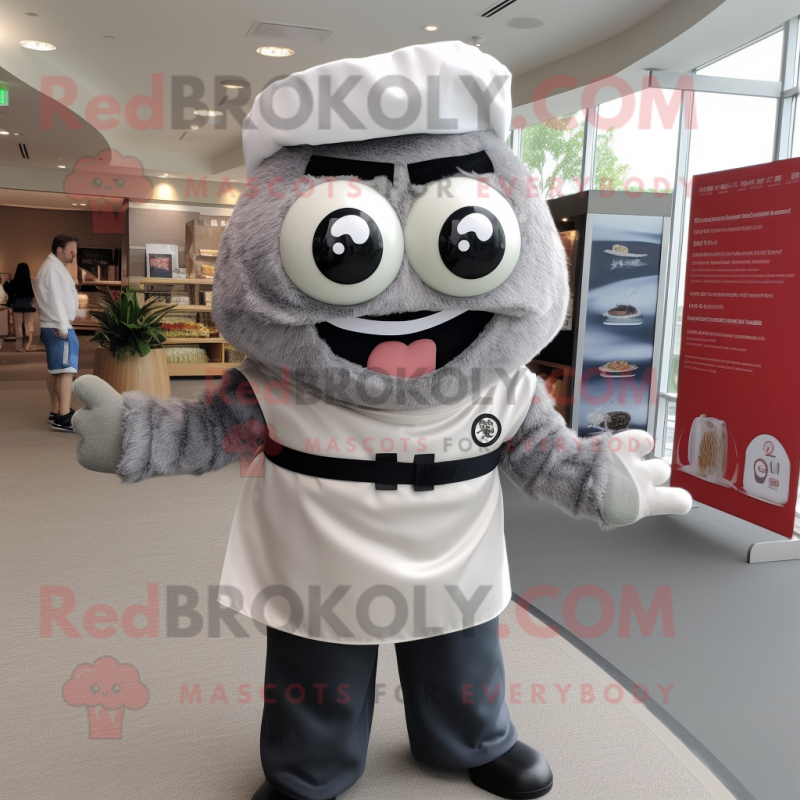 Gray Sushi mascot costume character dressed with a Oxford Shirt and Belts Gray Sushi mascot costume character dressed with a Oxford Shirt and Belts