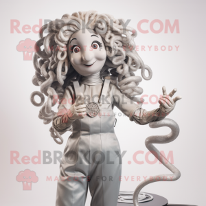 Silver Medusa mascot costume character dressed with a Overalls and Hairpins