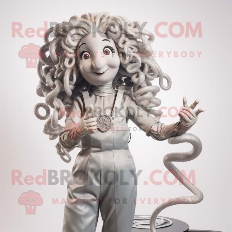 Silver Medusa mascot costume character dressed with a Overalls and Hairpins Silver Medusa mascot costume character dressed with a Overalls and Hairpins