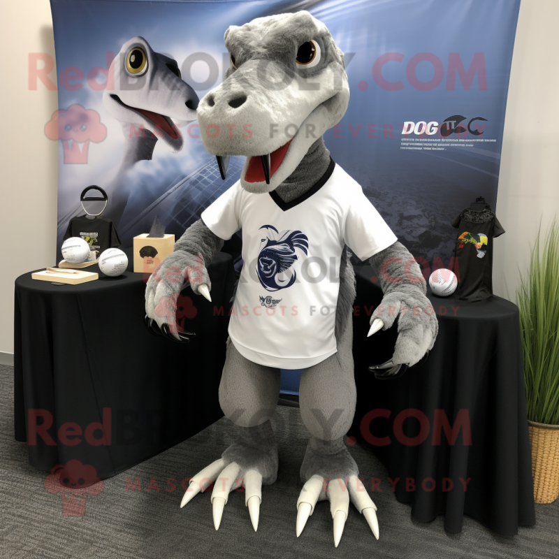 Gray Deinonychus mascot costume character dressed with a Polo Tee and Shawl pins