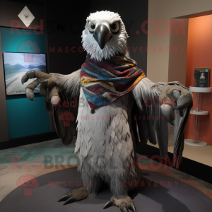 Gray Eagle mascot costume character dressed with a Graphic Tee and Shawls