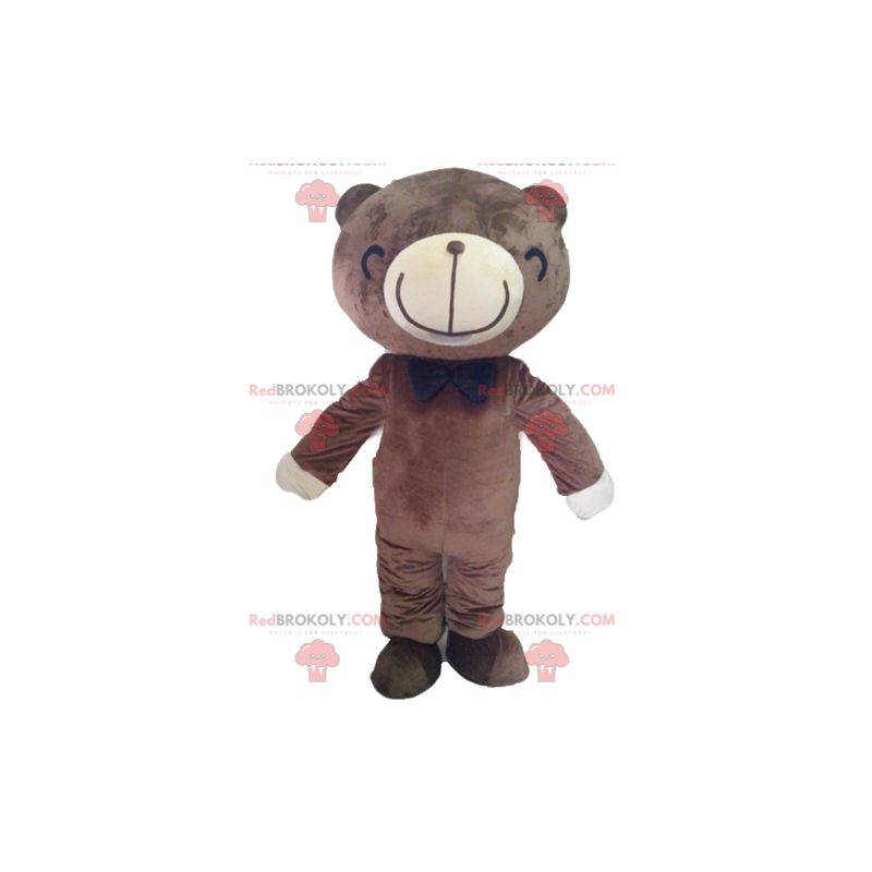 Mascote urso marrom e branco com um largo sorriso -