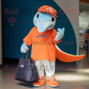 Orange Humpback Whale mascot costume character dressed with a Henley Tee and Tote bags