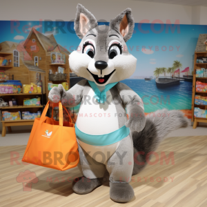 Gray Squirrel mascot costume character dressed with a Bikini and Tote bags