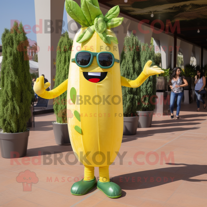 Gold Celery mascot costume character dressed with a Jeans and Sunglasses Gold Celery mascot costume character dressed with a Jeans and Sunglasses