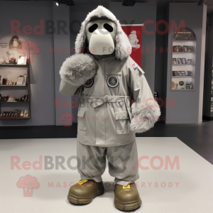 Silver American Soldier mascot costume character dressed with a Parka and Shoe clips