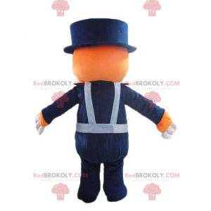 Mascotte orso arancione e bianco in uniforme blu -