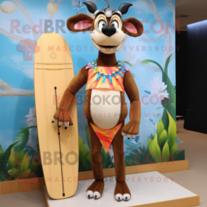 Peach Okapi mascot costume character dressed with a Board Shorts and Hair clips