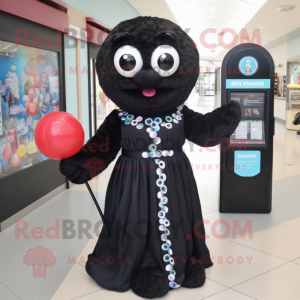 Black Gumball Machine mascot costume character dressed with a Maxi Dress and Tote bags