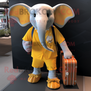 Gold Elephant mascot costume character dressed with a Board Shorts and Briefcases