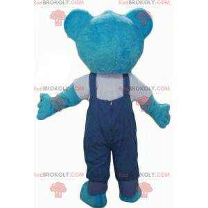 Mascote urso de pelúcia azul com macacão - Redbrokoly.com