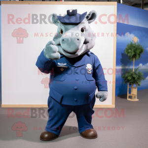 Navy Rhinoceros mascot costume character dressed with a Polo Shirt and Foot pads