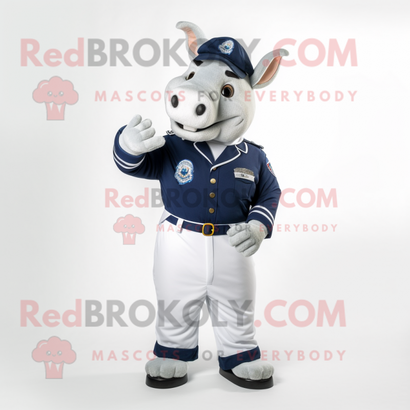 Navy Rhinoceros mascot costume character dressed with a Polo Shirt and Foot pads Navy Rhinoceros mascot costume character dressed with a Polo Shirt and Foot pads