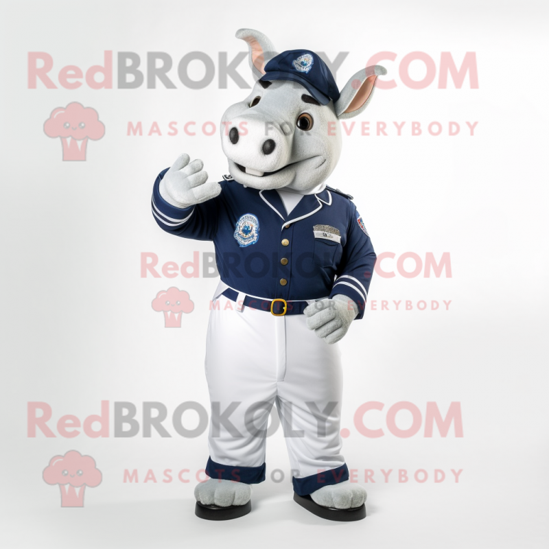 Navy Rhinoceros mascot costume character dressed with a Polo Shirt and Foot pads