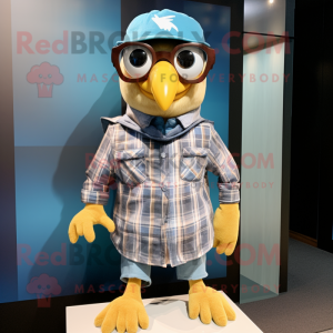 Gold Quail mascot costume character dressed with a Chambray Shirt and Beanies