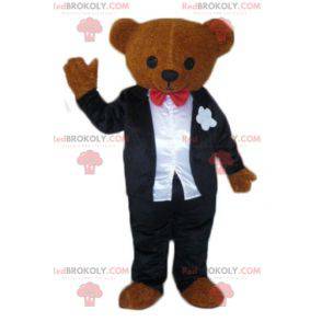 Brown teddy bear mascot dressed in a black and white costume -