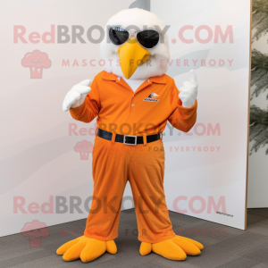 Orange Bald Eagle mascot costume character dressed with a Capri Pants and Pocket squares