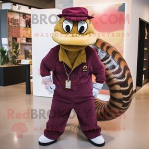 Maroon Anaconda mascot costume character dressed with a Corduroy Pants and Brooches