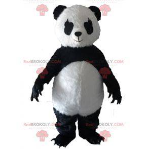 Mascotte de panda noir et blanc avec de grandes griffes -