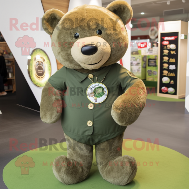 Olive Teddy Bear mascot costume character dressed with a T-Shirt and Lapel pins Olive Teddy Bear mascot costume character dressed with a T-Shirt and Lapel pins