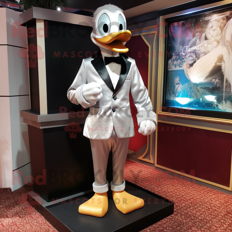 Silver Duck mascot costume character dressed with a Tuxedo and Scarves