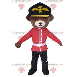 Mascotte dell'orso bruno vestita in abito da soldato inglese -