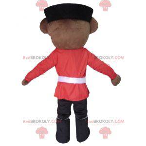 Mascote urso pardo vestido com roupa de soldado inglês -