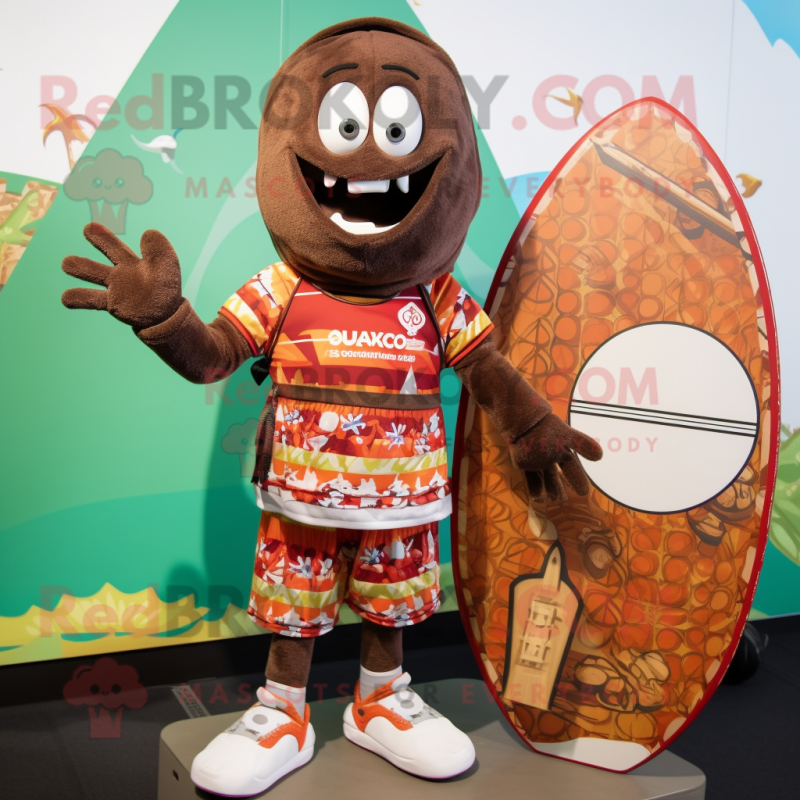 Brown Shakshuka mascot costume character dressed with a Board Shorts and Bracelets Brown Shakshuka mascot costume character dressed with a Board Shorts and Bracelets