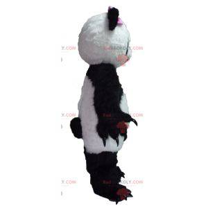 Mascotte de panda noir et blanc avec un nœud rose -