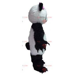 Mascotte del panda in bianco e nero con un fiocco rosa -