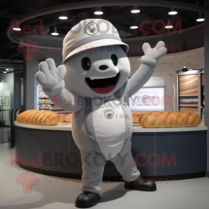 Gray Croissant mascot costume character dressed with a Baseball Tee and Caps