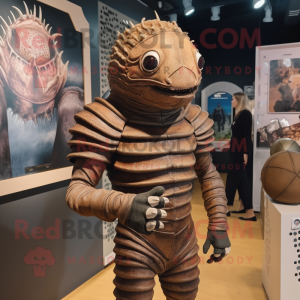 Brown Trilobite mascot costume character dressed with a Rash Guard and Cummerbunds