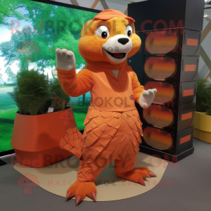 Orange Pangolin mascot costume character dressed with a Dress Shirt and Shoe laces