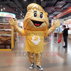 Gold Croissant mascot costume character dressed with a T-Shirt and Anklets