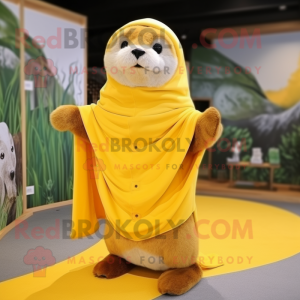 Yellow Otter mascot costume character dressed with a Coat and Shawls