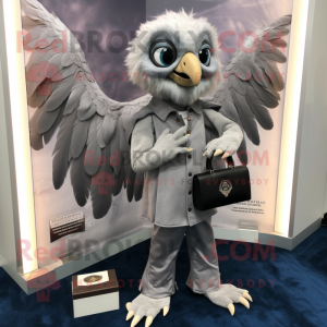 Silver Harpy mascot costume character dressed with a Oxford Shirt and Wallets