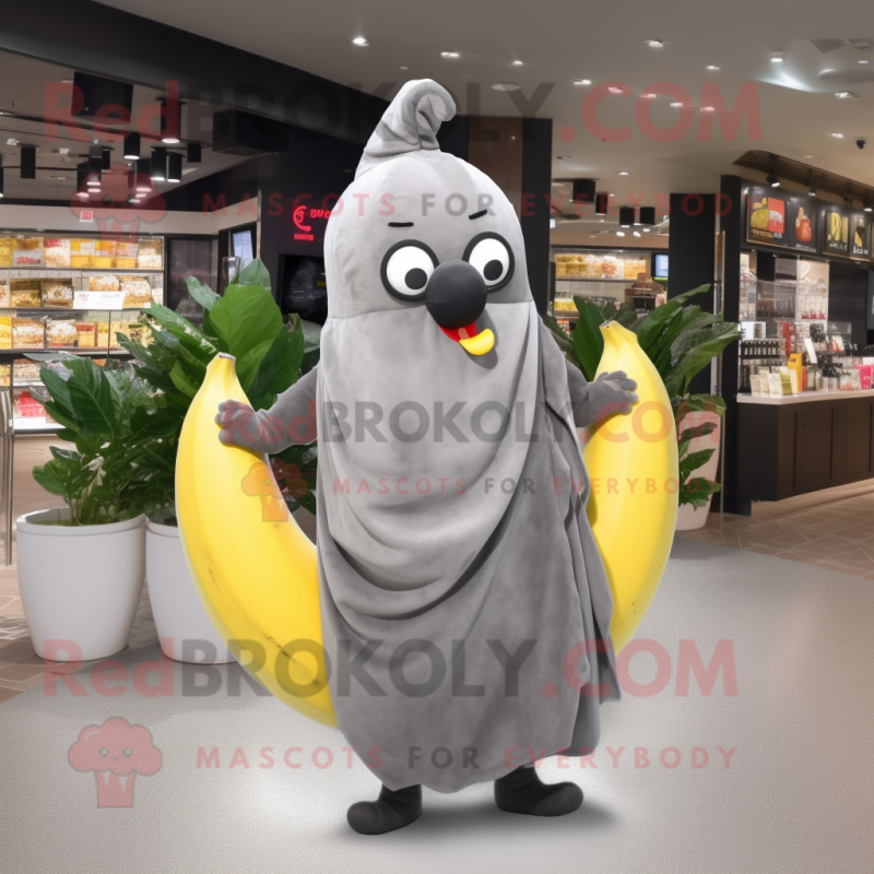 Gray Banana mascot costume character dressed with a T-Shirt and Shawl pins Gray Banana mascot costume character dressed with a T-Shirt and Shawl pins