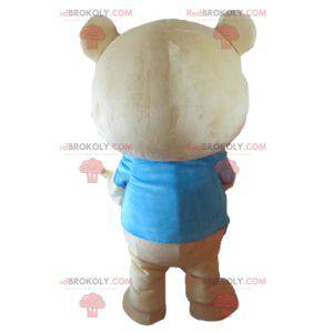 Mascotte grote beige teddybeer met een blauw t-shirt -