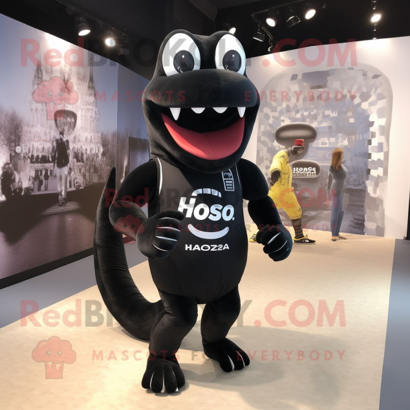 Black Hydra mascot costume character dressed with a Running Shorts and Messenger bags