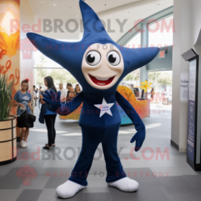 Navy Starfish mascot costume character dressed with a Yoga Pants and Messenger bags