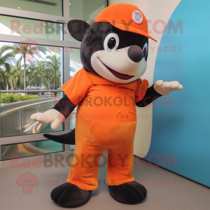 Orange Killer Whale mascot costume character dressed with a Bermuda Shorts and Cummerbunds