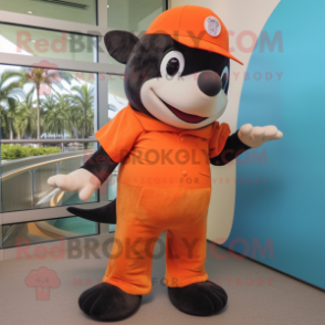 Orange Killer Whale mascot costume character dressed with a Bermuda Shorts and Cummerbunds
