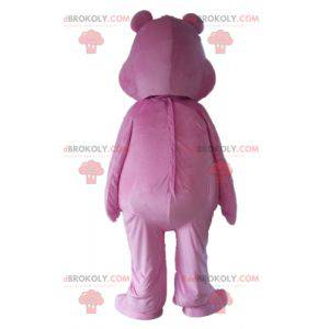 Pink Care Bear Maskottchen mit einem Regenbogen auf dem Bauch -