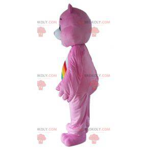 Pink Care Bear Maskottchen mit einem Regenbogen auf dem Bauch -