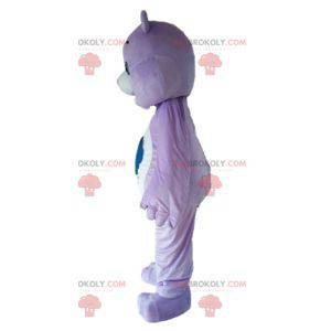 Mascote urso roxo e branco com uma nuvem - Redbrokoly.com